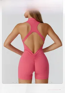 Detailed back view of pink racerback sports romper with ruched booty design