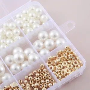 Comprehensive DIY jewelry kit with white pearls and gold spacer beads in a clear organizer box