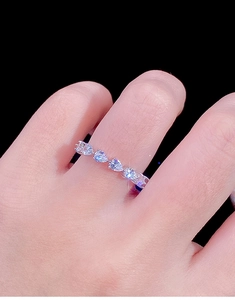 Close-up of S925 silver ring featuring heart-cut cubic zirconia in a multi-prong setting