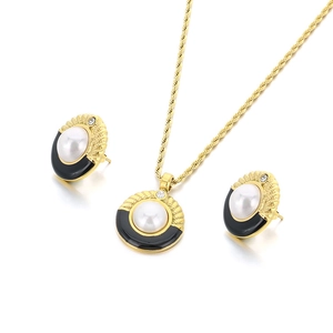 Set catena a spirale oro vintage con smalto nero e ciondoli in perla di conchiglia