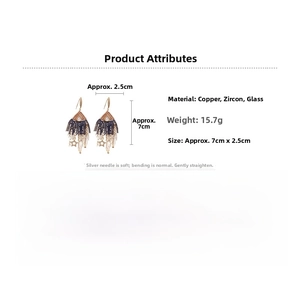 Detailed view of bohemian tassel earrings with purple beads, zircon stars and glass drops