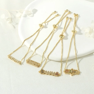 Macro view of adjustable MAMA bracelets with colorful zircons and fine gold plating