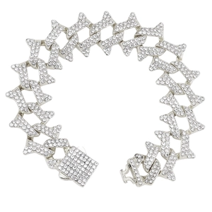 Detailed view of silver iced-out cuban link bracelet with thorns and box clasp closure