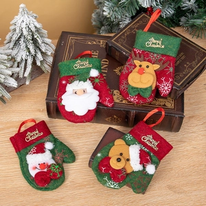 Set of four Christmas glove ornaments featuring Santa, Reindeer, Snowman, and Bear designs