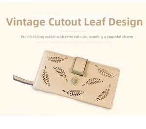 Detail of laser-cut leaf pattern and metal pendant on a cream minimalist long wallet