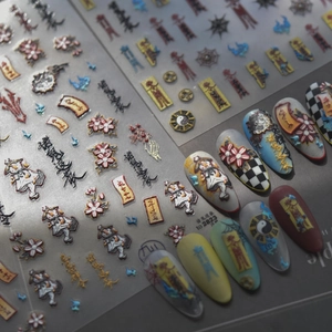 Detail of 3D embossed nail art stickers with traditional Chinese patterns and talismans