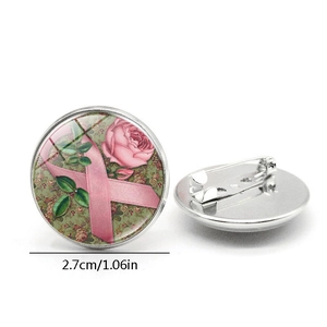 Vintage glass brooch with pink ribbon and roses on a silver metal base, 2.7cm diameter