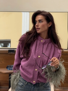 Purple knit cardigan with embossed gold buttons and grey faux fur trim on cuffs