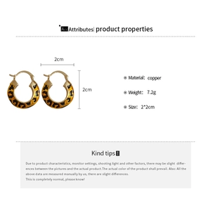 Detail showing 14k gold-plated leopard print round hoop earrings with size specifications