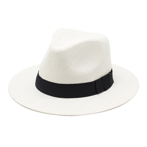 Classic Panama straw hat for sun protection featuring a beige weave and black ribbon band