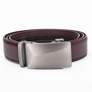 Close-up of brown lychee grain leather belt with brushed gunmetal automatic buckle