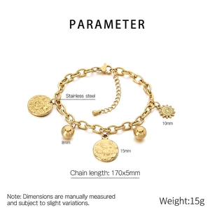 Detail showing 18K gold-plated stainless steel bracelet with sun and relief charms