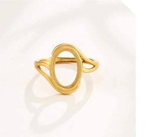 Macro shot of gold oval ring base with wavy band for DIY gemstone setting