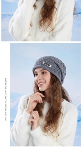 Detailed knit texture of gray winter beanie featuring a signature woven brand label