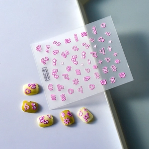 5D stereoscopic embossed nail stickers with pink hearts and bows on white tray