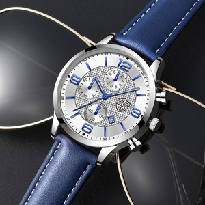 Gros plan détaillé du cadran de montre à quartz avec texture diamantée et dateur
