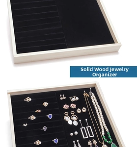 Dual-section solid wood jewelry tray with black velvet slots for rings and earrings