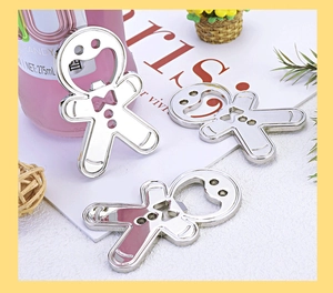Macro detail of gingerbread man bottle openers in polished silver alloy with creative design
