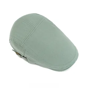 Top view of sage green flat cap featuring twill cotton fabric and adjustable side buckle