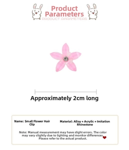 Détail d'une pince à cheveux fleur rose avec strass et indication de taille de 2cm