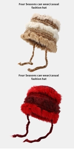 Detail of plush knit beanie with earflaps and long braided ties in striped colorways