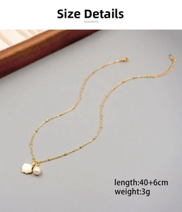 Detailed view of freshwater pearl and shell pendant necklace with 40+6cm size specifications