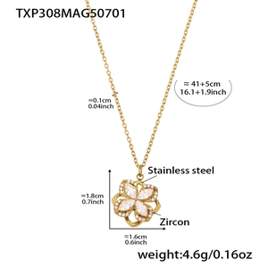 Detailed view of golden stainless steel clover pendant with cubic zirconia stones and measurements