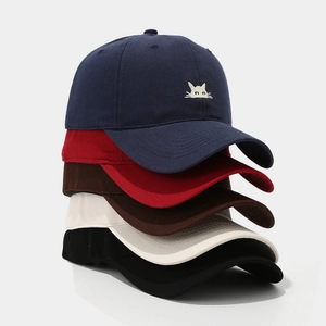 Five assorted colors of cotton baseball caps with minimalist cat head embroidery decoration