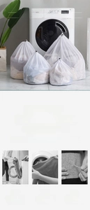 Detail of multi-size mesh laundry bags with drawstring closure for washing machine protection