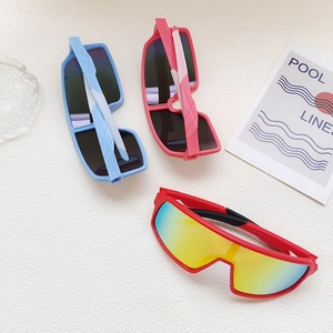 Kids cycling sports sunglasses with wrap-around frames and reflective lenses for boys and girls