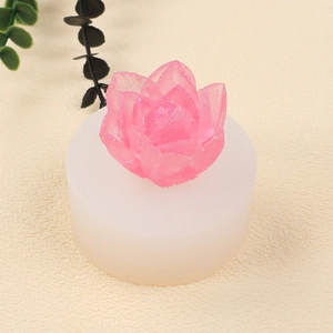 Macro shot of 3D peony silicone mold with a pink glittery flower candle finished product