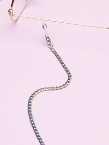 Detailed view of colorful iridescent metal wavy glasses chain with silicone connectors
