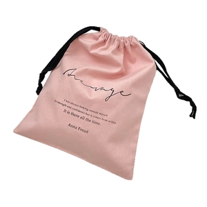 Pink linen cotton drawstring storage bag with inspirational quote for travel packing