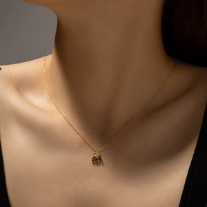 S925 sterling silver honey bee necklace with green and clear zircon on a gold chain
