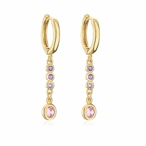 Close-up of gold hoop earrings with hanging purple and pink zircon crystal chains