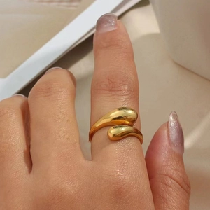 Polished 18K gold waterdrop wrap ring with an irregular open adjustable design