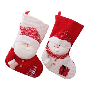 Large knitted Christmas stockings featuring 3D Santa and Snowman in red and white