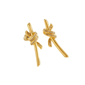 Elegant gold knot stud earrings with sparkling pavé crystals and polished metallic finish