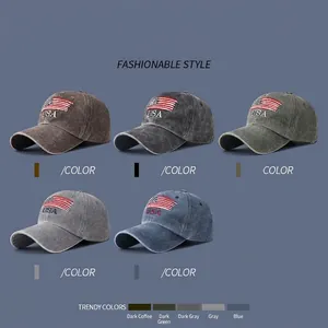 Washed cotton baseball caps with USA embroidery in five colors on a blue background