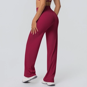 Detail view of high-waist wine red wide leg yoga pants with slimming matte fabric texture