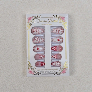 Detailed set of 24 almond press-on nails with red hearts, bows and I Love You text