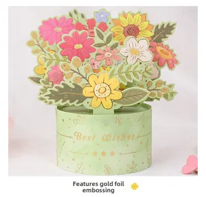 Detailed 3D pop-up card featuring a vibrant floral bouquet and gold foil Best Wishes text