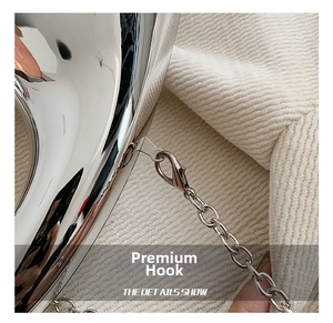 Detail of premium silver acrylic handbag chain with high-quality metal lobster clasp