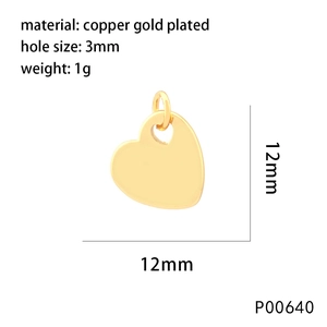 Macro view of 12mm 18k gold plated copper heart pendant with cubic zirconia inlay and 3mm hole