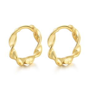 Detail shot of golden S925 sterling silver hoop earrings with twisted ripple design
