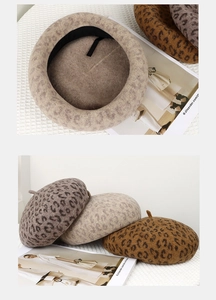 Detail view of leopard print wool berets in grey, beige and brown color options
