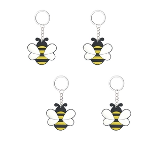 Set di quattro portachiavi a forma di ape in PVC con strisce gialle e ali bianche