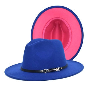 Blue fedora hat with pink contrast brim and black leather band with silver buckle