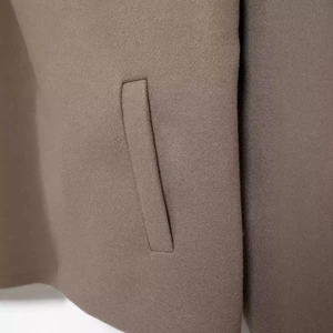 Women's British style loose wool blend coat in brown with classic lapels and welt pockets