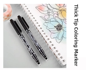 Dual-tip black marker pen detail showing broad chisel tip and fine point for drawing